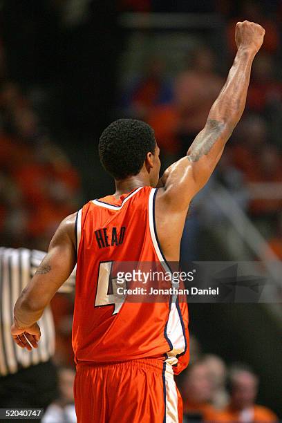 Luther Head of the Illinois Fighting Illini celebrates an overtime win against the Iowa Hawkeyes on January 20, 2005 at the Assembly Hall at the...