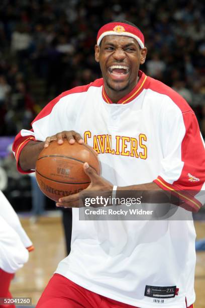 LeBron James of the Cleveland Cavaliers enjoys laughing around with some teammates before the game against the Sacramento Kings on January 20, 2005...