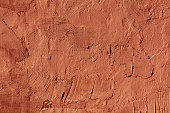 Abstract red cement wall texture.