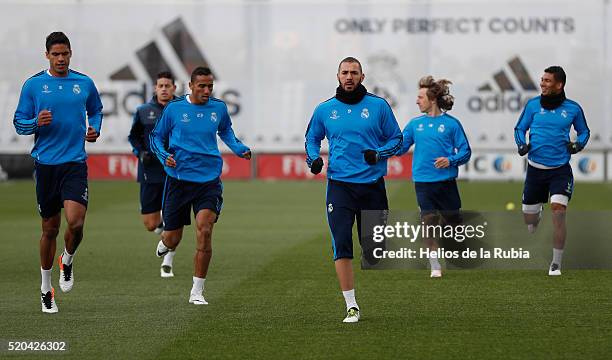 The players of Real Madrid warm up during a training session at Valdebebas training ground on April 11, 2016 in Madrid, Spain.