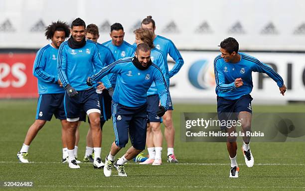 The players of Real Madrid warm up during a training session at Valdebebas training ground on April 11, 2016 in Madrid, Spain.