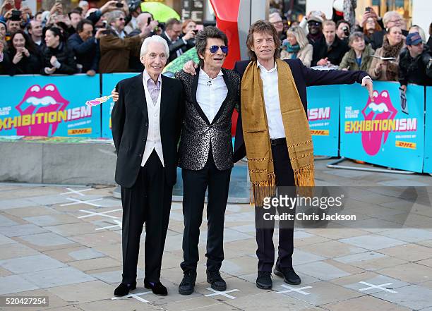 Charlie Watts, Ronnie Wood and Mick Jagger arrive for the private view of 'The Rolling Stones: Exhibitionism' at the Saatchi Gallery on April 4, 2016...