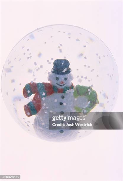 snowstorm globe with snowman - funny snow globe stock pictures, royalty-free photos & images