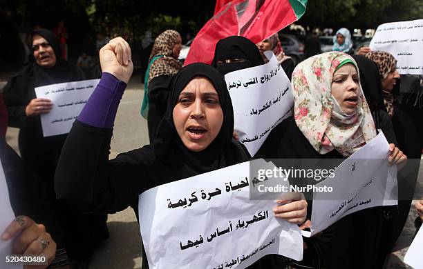 Supporters of the Popular Front for the Liberation of Palestine hold banners during a demonstration against unemployment and poverty The interruption...