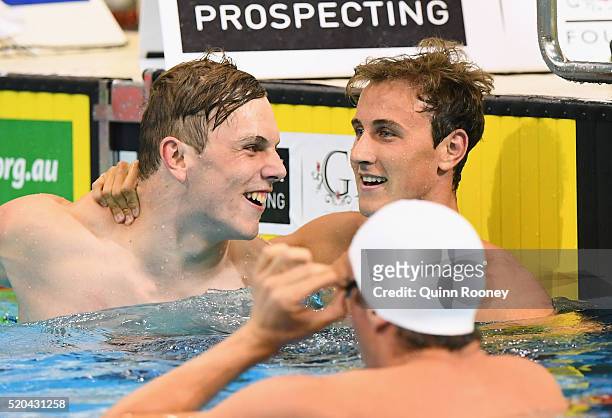 Cameron McEvoy of Australia is congratulated by Kyle Chalmers after winning the Men's 100 Metre Freestyle during day five of the Australian Swimming...