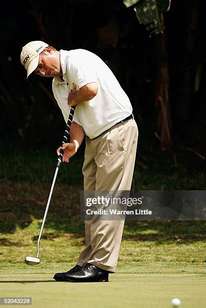 Tim Clark of South Africa putts on the seventh green during the second round of the South African Airways Open at Durban Country Club on January 21,...