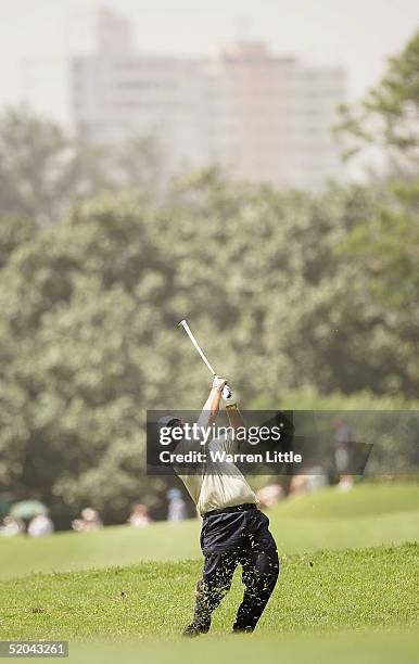 Titch Moore of South Africa plays his second shot into the eighth green during the second round of the South African Airways Open at Durban Country...