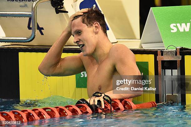 Mitch Larkin of Australia reacts after the Men's 200 metre Backstroke during day five of the Australian Swimming Championships at the South...