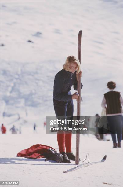Blonde skier on the slopes at Verbier, February 1964.