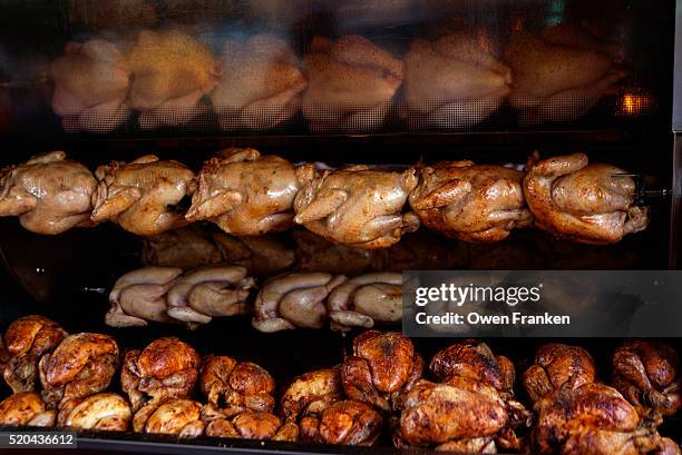 chicken display at the colmar market - rotisserie stock pictures, royalty-free photos & images