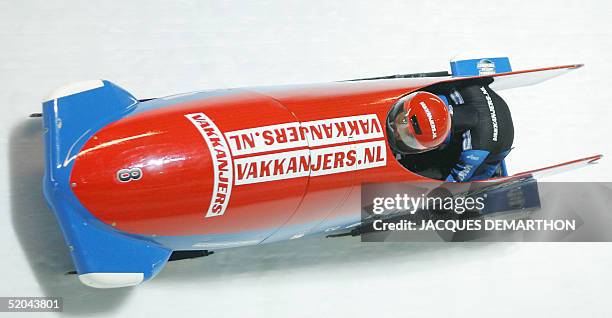 Netherlands Eline Jurg and Brakewoman Christel Bertens slide, 21 January 2005 at Cesana Pariol during the 1st run of the 5th 2Women Bobsleigh World...