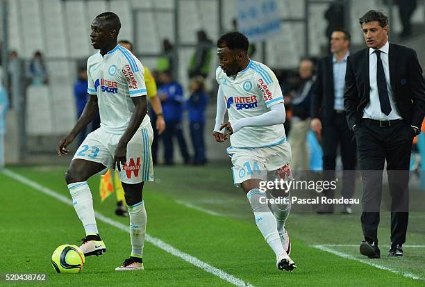 Benjamin Mendy from Marseille with the ball in front team mate Georges Kévin Nkoudou Mbida and Marseille coach José Miguel Gonzales Martin Del Campo...