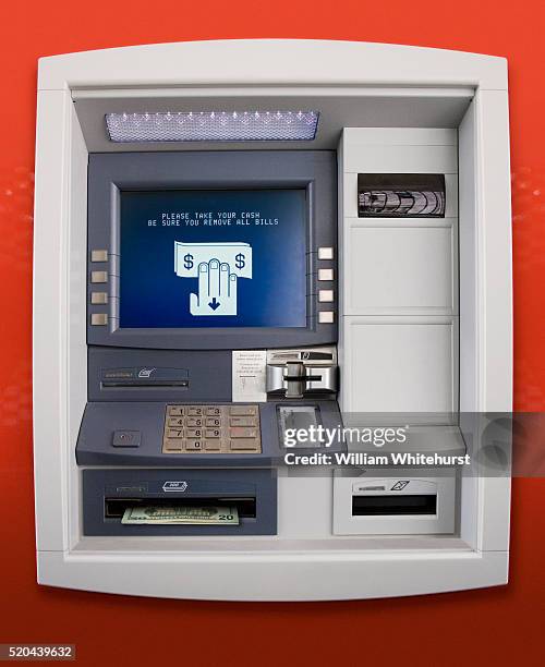 withdrawing cash from atm - atm stock pictures, royalty-free photos & images