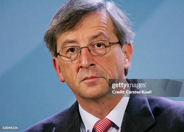 Luxembourg Prime Minister Jean-Claude Juncker speaks at a press conference with German Chancellor Gerhard Schroeder at the Chancellery on January 21,...