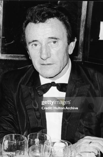 Portrait of French couturier Guy Laroche at a black tie event, 1980s.