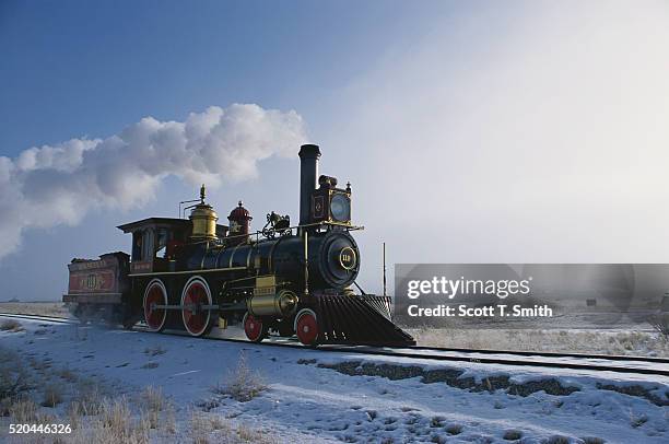 union pacific locomotive 119 moving down the tracks - locomotive fotografías e imágenes de stock