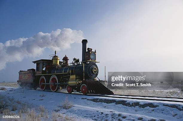 union pacific locomotive 119 moving down the tracks - steam train stock pictures, royalty-free photos & images