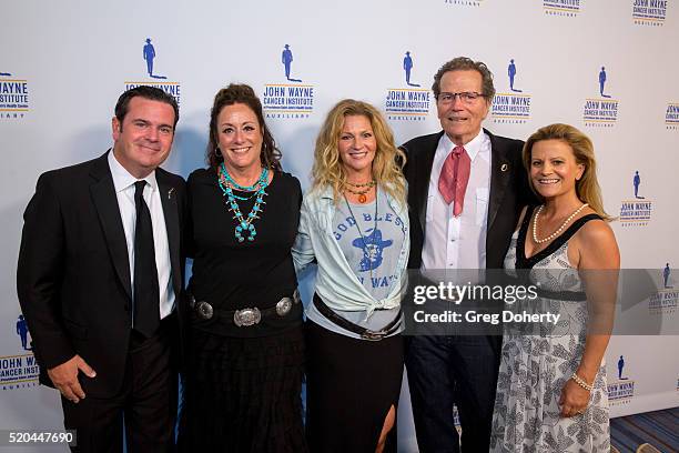 Michael Wayne , Auxiliary President of the John Wayne Cancer Institute Anita Swift, Marissa Wayne , Chairman Patrick Wayne and Melanie Wayne attend...