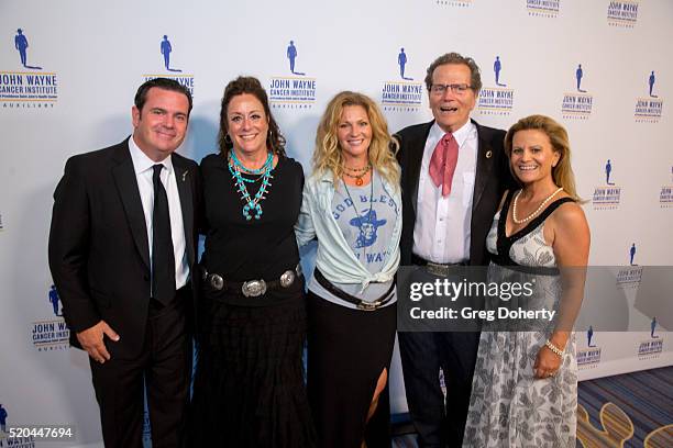 Michael Wayne , Auxiliary President of the John Wayne Cancer Institute Anita Swift, Marissa Wayne , Chairman Patrick Wayne and Melanie Wayne attend...