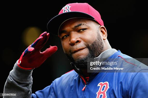 David Ortiz of the Boston Red Sox enters the dugout after batting practice before the Red Sox home opener against the Baltimore Orioles at Fenway...