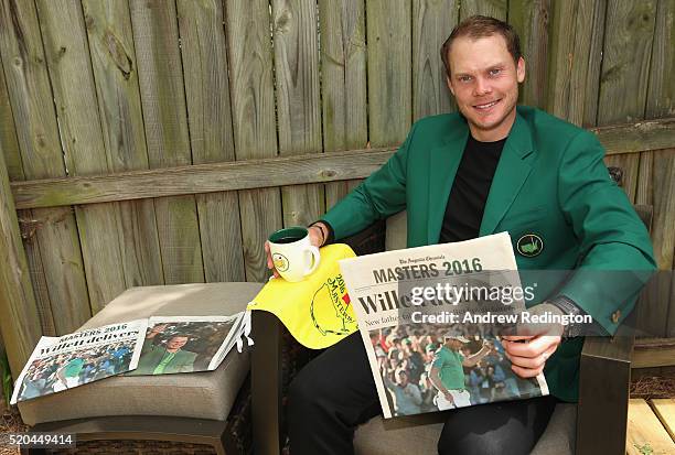 Danny Willett of England, the 2016 Masters champion, poses with his green jacket at his rented house on April 11, 2016 in Augusta, Georgia.