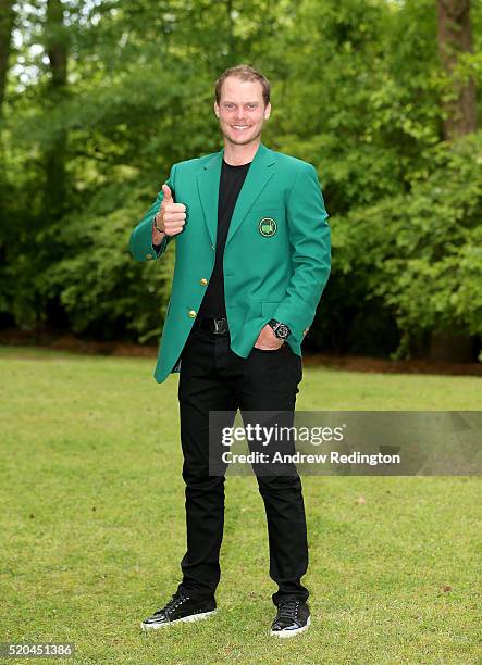 Danny Willett of England, the 2016 Masters champion, poses with his green jacket at his rented house on April 11, 2016 in Augusta, Georgia.