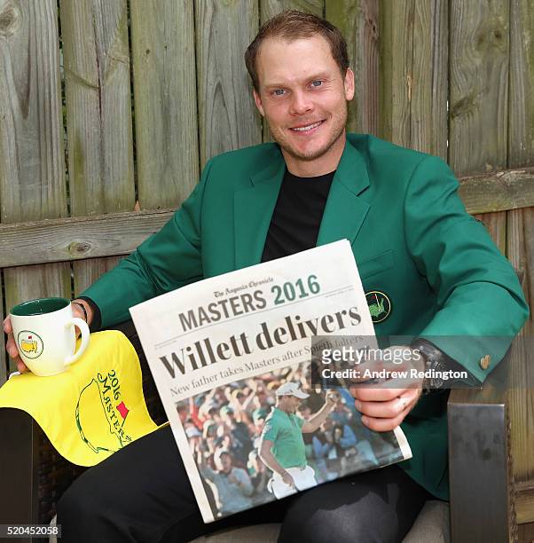 Danny Willett of England, the 2016 Masters champion, poses with his green jacket at his rented house on April 11, 2016 in Augusta, Georgia.