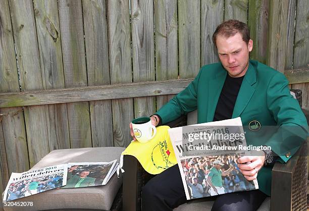 Danny Willett of England, the 2016 Masters champion, poses with his green jacket at his rented house on April 11, 2016 in Augusta, Georgia.