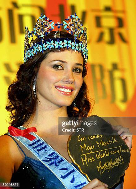 Miss World 2004, Maria Julia Mantilla Garcia of Peru, poses during an event in Beijing 22 January 2005, to promote the upcoming Miss World 2005...