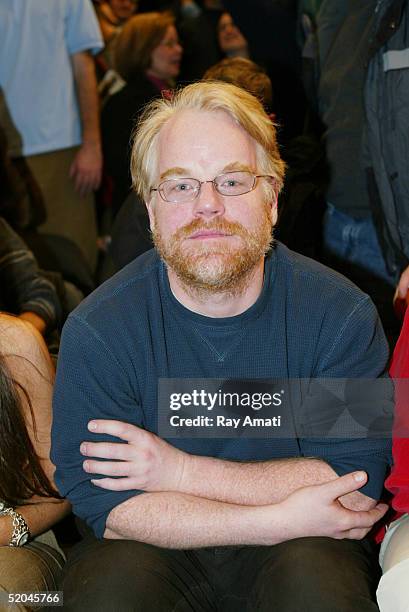 Actor Philip Seymour Hoffman sits courtside at the New York Knicks vs Houston Rockets NBA game at Madison Square Garden on January 21, 2005 in New...