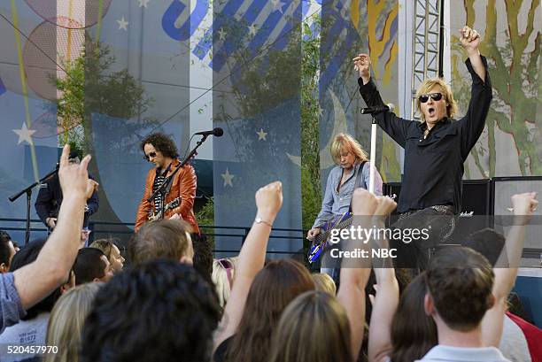 Episode 3151-- Pictured: Musicians Vivian Campbell, Rick Savage and Joe Elliott of musical guest Def Leppard perform on May 23, 2006 --