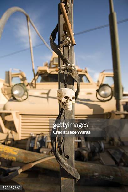 mrap, mine resistant ambush protected vehicle with toy skull on front - iraq tikrit stock pictures, royalty-free photos & images