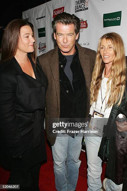 Actor Pierce Brosnan, his wife Keely Shaye-Smith and producer Beau St. Clair arrive at the Matador Premiere Party at Easy Street Brasserie during the...