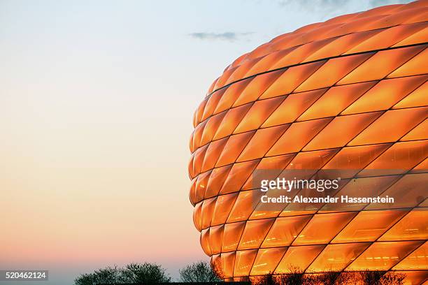 General view of the Allianz Arena as illuminated in Orange color during Illumination Tests on April 11, 2016 in Munich, Germany.