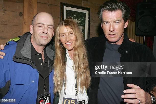 Executive producer Bob Yari, producer Beau St. Clair and actor Pierce Brosnan arrive at the Matador Premiere Party at Easy Street Brasserie during...