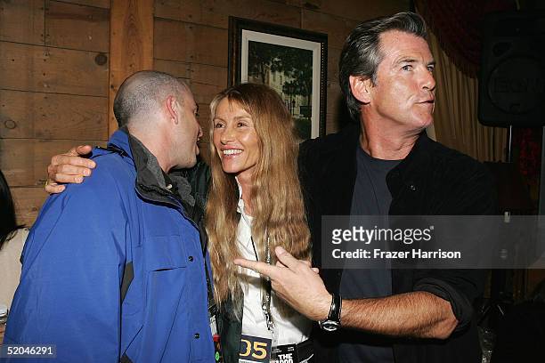 Executive producer Bob Yari, producer Beau St. Clair and actor Pierce Brosnan arrive at the Matador Premiere Party at Easy Street Brasserie during...