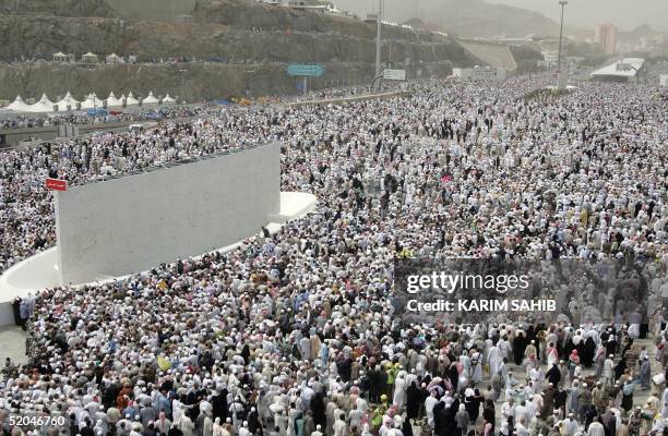 Muslim pilgrims participate in the "Stoning of Satan" ritual at Mina valley outside Mecca during the annual hajj pilgrimage, 22 January 2005. The...