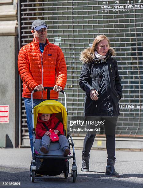 Chelsea Clinton, Marc Mezvinsky and their daughter Charlotte are seen on April 11, 2016 in New York City.