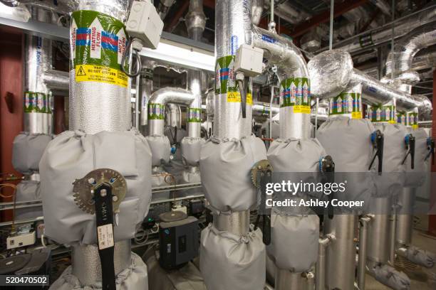 the ground source heat pump system at the crystal building - siemens stock pictures, royalty-free photos & images