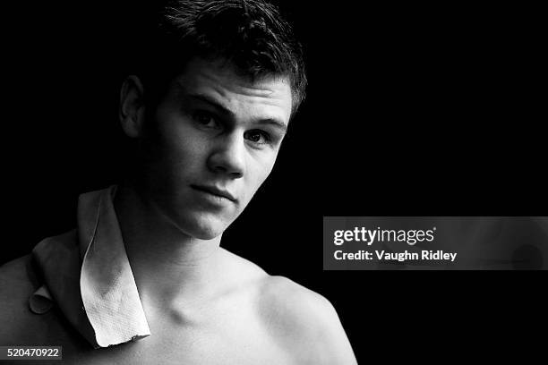Vincent Riendeau of Canada checks the scoreboard and sees that he won Gold in the Men's 10m Final during Day Three of the FINA Diving Grand Prix at...