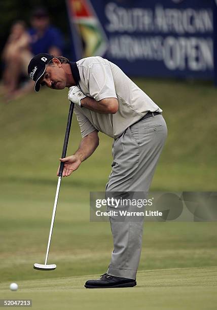 Hendrik Buhrmann of South Africa putts on the 13th green during the third round of the South African Airways Open at Durban Country Club on January...