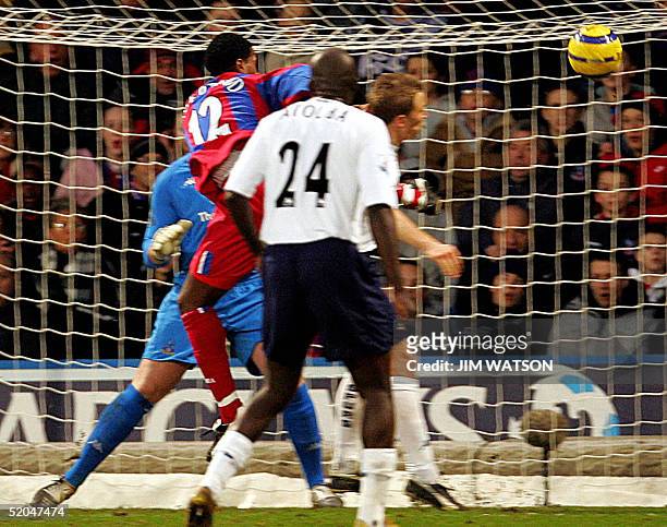 Tottenham's Thimothee Atouba watches as Crystal Palace's Mikele Leigertwood scores during Premiership match 22 January 2005 at Selhurst Stadium in...
