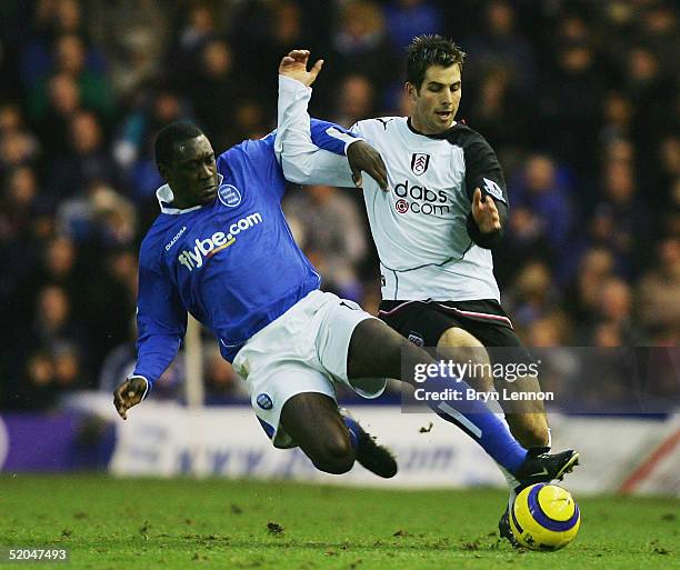 Emile Heskey of Birmingham City tackles Carlos Bocanegra of Fulham during the Barclays Premiership match between Birmingham City and Fulham at St...