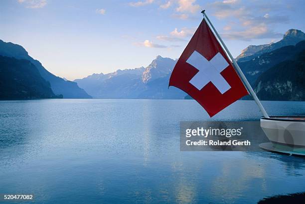 lake vierwaldstatter, switzerland - switzerland flag stock pictures, royalty-free photos & images