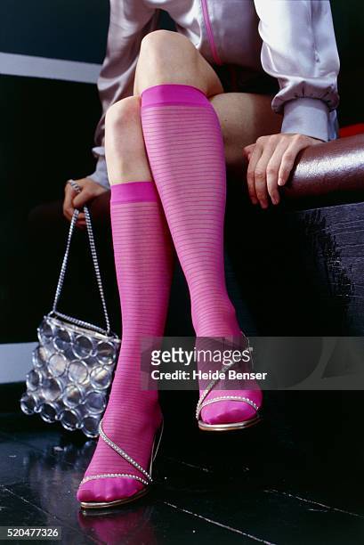 young woman wearing pink stockings - kneesock fotografías e imágenes de stock