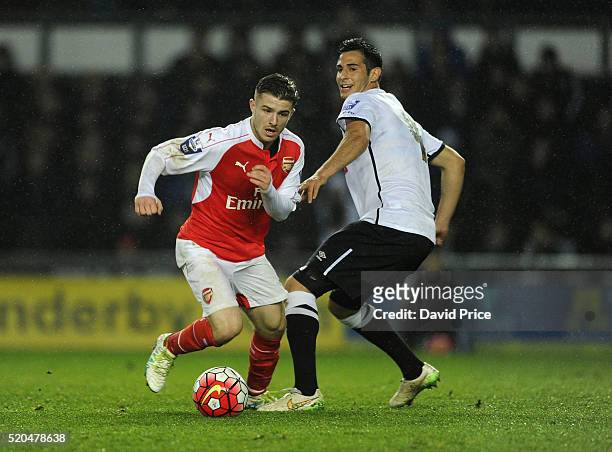 Dan Crowley of Arsenal takes on Tom Koblenz of Derby during the Barclays U21 Premier League match between Derby County U21 and Arsenal U21 at iPro...