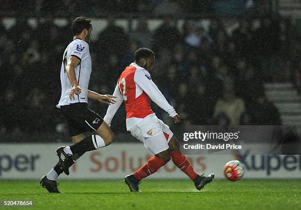 Kaylen Hinds scores Arsenal's 2nd goal under pressure from Farrend Rawson of Derby during the Barclays U21 Premier League match between Derby County...