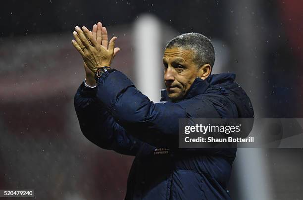 Manager of Brighton and Hove Albion, Chris Houghton celebrates with fans following Sky Bet Championship match between Nottingham Forest and Brighton...