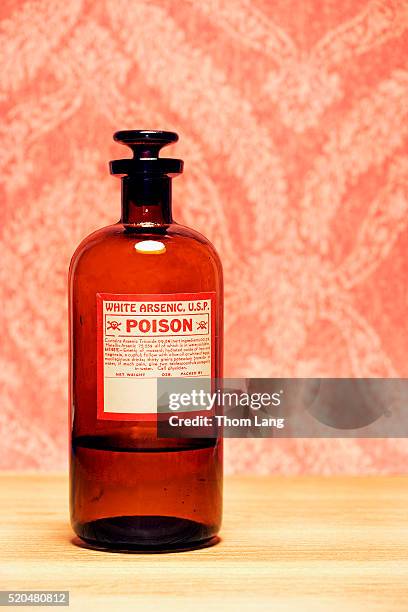 bottle of arsenic - toxin stockfoto's en -beelden