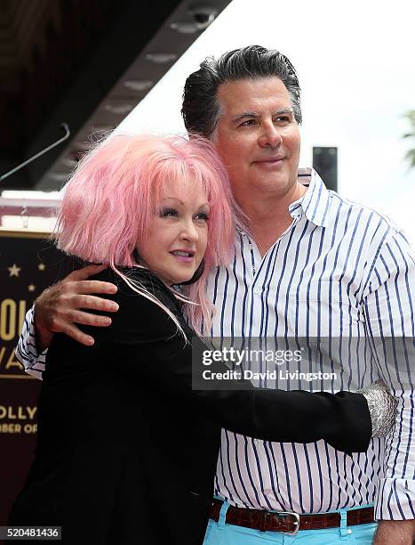 Singer Cyndi Lauper and husband actor David Thornton attend Cyndi Lauper and Harvey Fierstein being honored with a Double Star ceremony on the...
